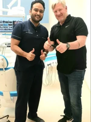 Dr. Prashanth with Hollywood Director Bruce Macdonald following his dental treatment.
